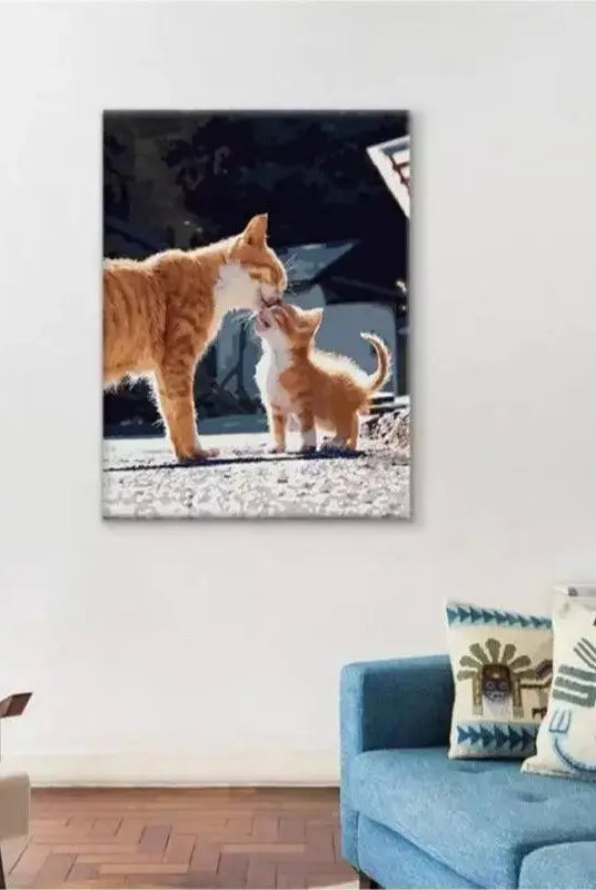 Finished two - cat painting hanging on the wall above sofa in living room scene