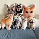 A golden retriever pillow and French bulldog pillow together with other custom throw pillows on a sofa 